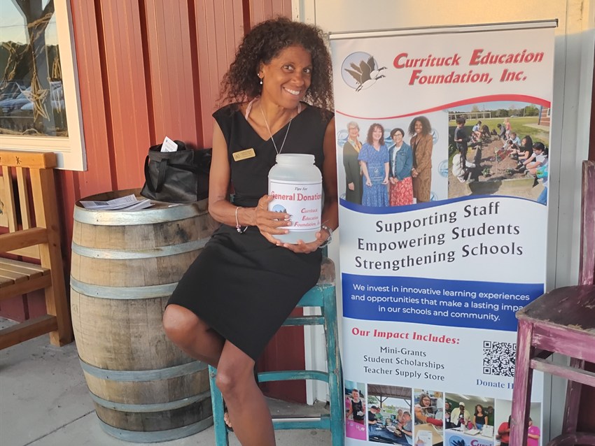 Courtney volunteering at Sanctuary Vineyards for the Currituck Education Foundation benefit in Jarvisburg